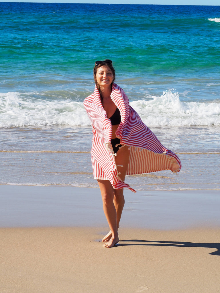 Elevate your beach look with a stylish Turkish cotton beach towel